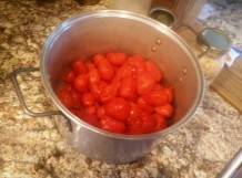 Cook skinned tomatoes